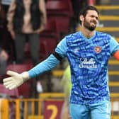 Craig Gordon took a knock to the knee against Motherwell.  (Photo by Craig Foy / SNS Group)