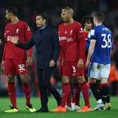 Mohamed Salah of Liverpool interacts with Giovanni van Bronckhorst, Manager of Rangers after the UEFA Champions League group A match between Liverpool FC and Rangers FC at Anfield on October 04, 2022 in Liverpool, England. (Photo by Clive Brunskill/Getty Images)