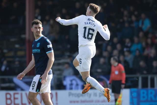 Aaron Ramsey leaps in celebration after scoring his first goal for Rangers to equalise in their 2-1 win over Dundee at Dens Park. (Photo by Alan Harvey / SNS Group)