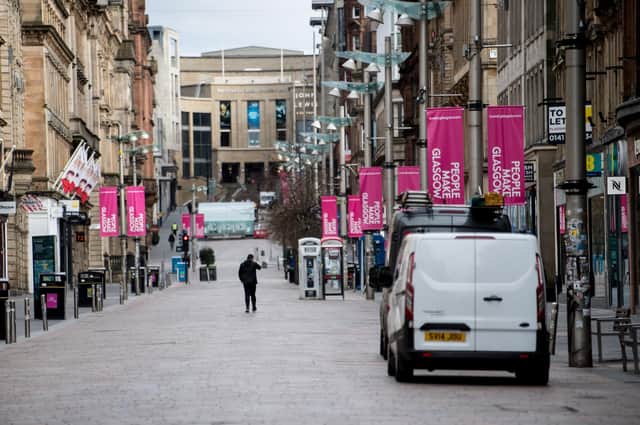 A virtually empty Buchanan Street in Glasgow as people observe the spring lockdown. Experts are forecasting another gloomy year for the Scottish high street. Picture : John Devlin