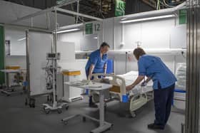 Nurses make final preparations during the completion of the construction of the NHS Louisa Jordan hospital, built at the SEC Centre in Glasgow
