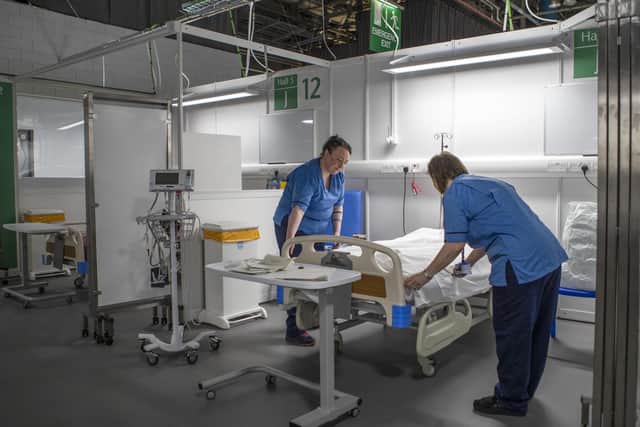 Nurses make final preparations during the completion of the construction of the NHS Louisa Jordan hospital, built at the SEC Centre in Glasgow