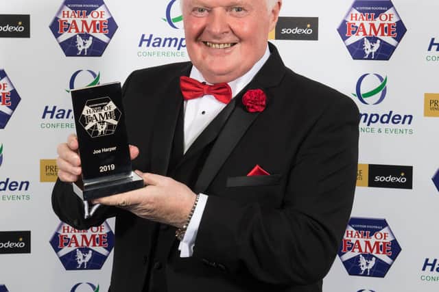 Joe Harper is presented with his award as he is inducted into the Scottish Football Hall of Fame at Hampden Park, on October 27, 2019, in Glasgow, Scotland.
