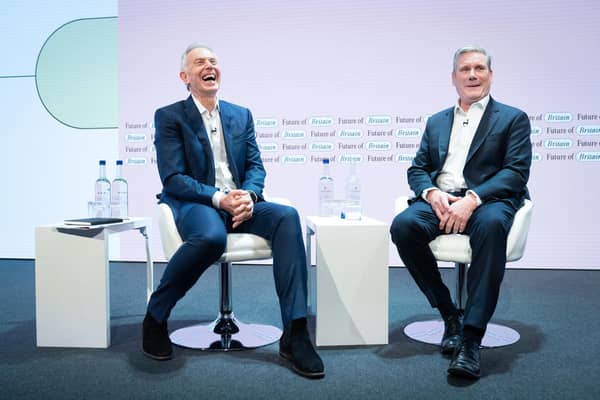 Former Prime Minister Tony Blair (left) and Labour leader Sir Keir Starmer discuss politics during the Tony Blair Institute for Global Change's Future of Britain Conference earlier this year.