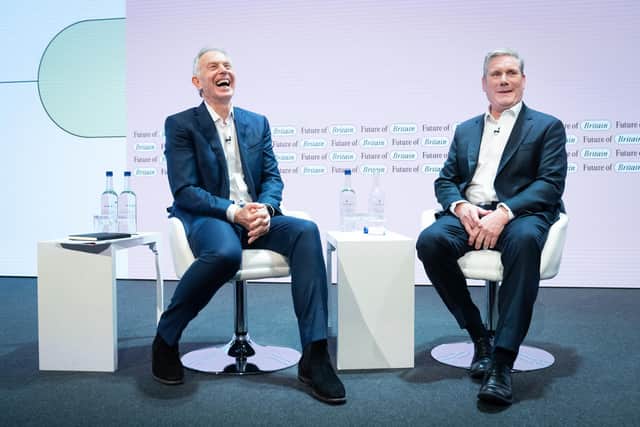 Former Prime Minister Tony Blair (left) and Labour leader Sir Keir Starmer discuss politics during the Tony Blair Institute for Global Change's Future of Britain Conference earlier this year.