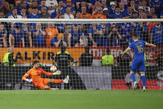 Rangers substitute Aaron Ramsey sees his penalty saved by Eintracht Frankfurt goalkeeper Kevin Trapp.