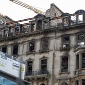 Part of Princes Street still remains closed to the pubic and traffic after a fire broke out in the former Debenhams building