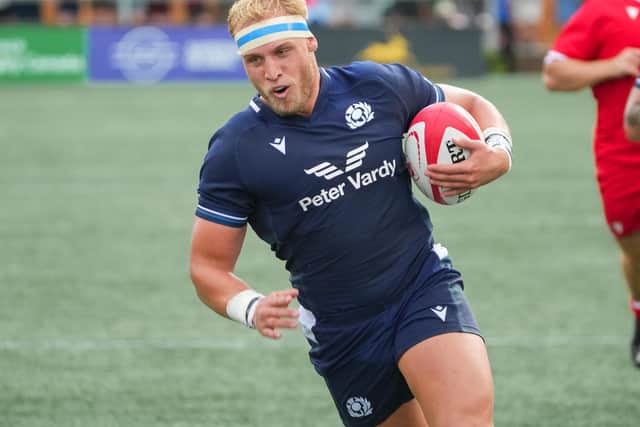 Dylan Richardson scores a first half try for Scotland against Canada. (Photo by Chris Tanouye/Getty Images for Scottish Rugby)