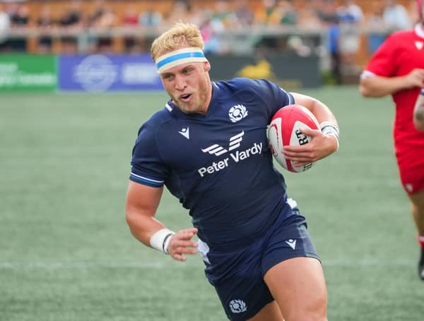 Dylan Richardson scores a first half try for Scotland against Canada. (Photo by Chris Tanouye/Getty Images for Scottish Rugby)