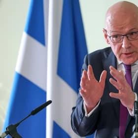 First Minister John Swinney speaks at Bute House. 