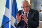 First Minister John Swinney.