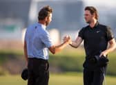 Scott Jamieson, left, congratulates Thomas Pieters after the final round of last year's Abu Dhabi HSBC Championship at Yas Links. Picture: Ryan Lim/AFP via Getty Images.