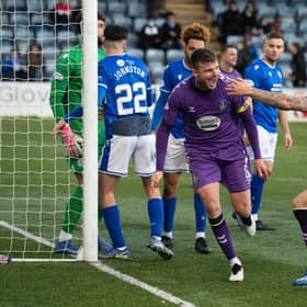 Kilmarnock's Chris Stokes celebrates scoring the opener in the 2-0 win over Queen of the South (Photo by Craig Foy / SNS Group)