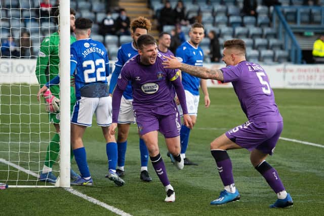 Kilmarnock's Chris Stokes celebrates scoring the opener in the 2-0 win over Queen of the South (Photo by Craig Foy / SNS Group)