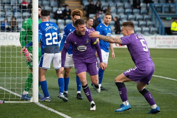 Kilmarnock's Chris Stokes celebrates scoring the opener in the 2-0 win over Queen of the South (Photo by Craig Foy / SNS Group)