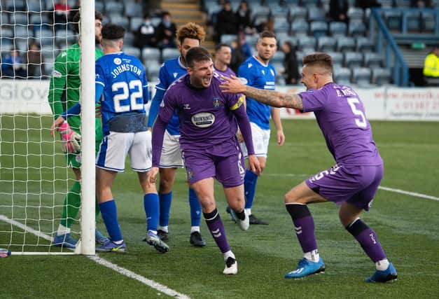 Kilmarnock's Chris Stokes celebrates scoring the opener in the 2-0 win over Queen of the South (Photo by Craig Foy / SNS Group)