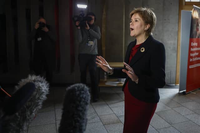 First Minister Nicola Sturgeon talks with the gathered media following First Minister's Questions at the Scottish Parliament