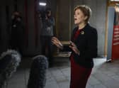 First Minister Nicola Sturgeon talks with the gathered media following First Minister's Questions at the Scottish Parliament