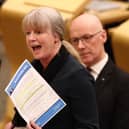 First Minister John Swinney looks on as Finance Secretary Shona Robison presents the government's Budget. Picture: Jeff J Mitchell/Getty Images