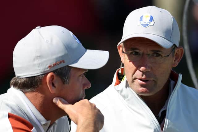 Padraig Harrington, right, has watched his team lose the opening three sessions in the 43rd Ryder Cup at Whistling Straits. Picture: Warren Little/Getty Images.