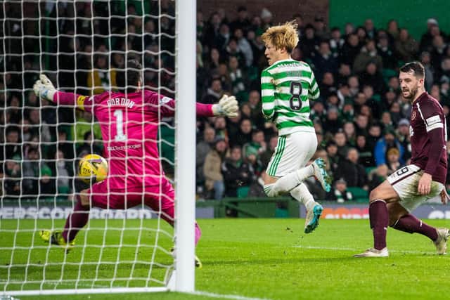 Celtic’s Kyogo Furuhashi clips home the winner against Hearts on December 2 - but VAR would have ruled it out for offside. (Photo by Craig Foy / SNS Group)