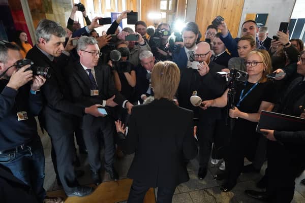 Former first minister Nicola Sturgeon talking to journalists as she returns to the Scottish Parliament. Picture: Andrew Milligan/PA Wire