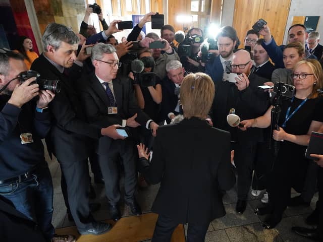 Former first minister Nicola Sturgeon talking to journalists as she returns to the Scottish Parliament. Picture: Andrew Milligan/PA Wire