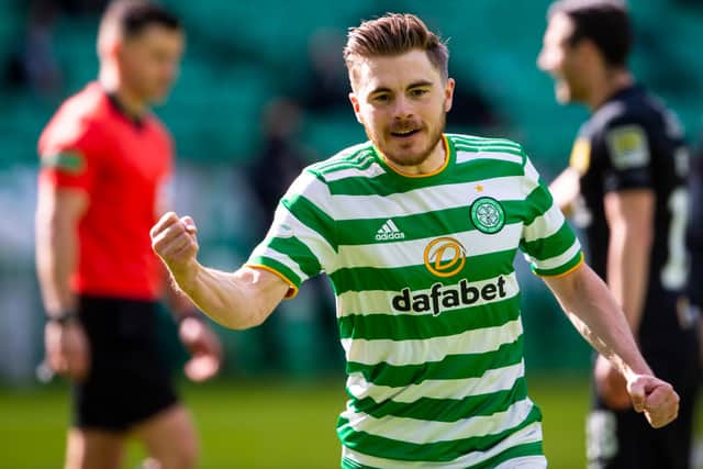 James Forrest celebrates opening the scoring for Celtic against Livingston.