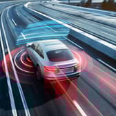 Collision warning systems scan and monitor the road ahead, scouring for danger (Picture: Adobe)