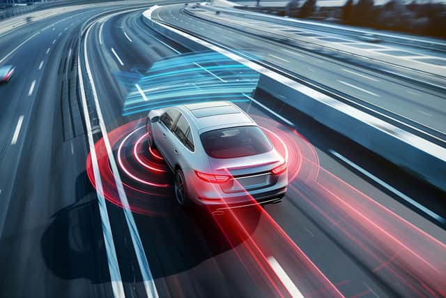 Collision warning systems scan and monitor the road ahead, scouring for danger (Picture: Adobe)