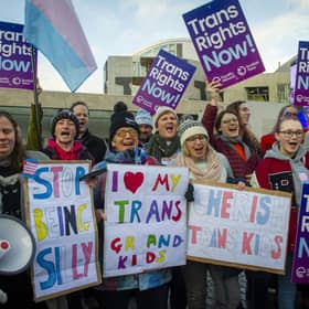 Trans rights supporters demonstrating outside the Scottish Parliament. Image: Lisa Ferguson/National World.