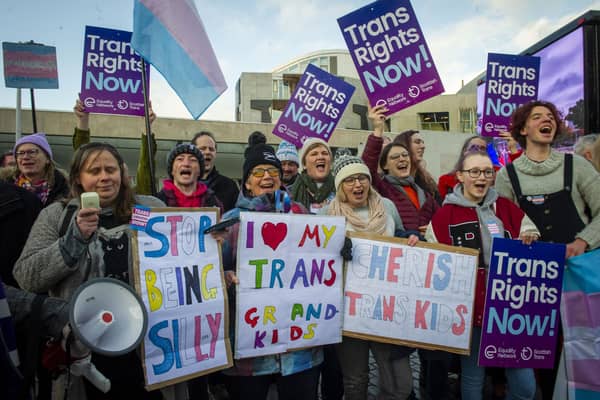 Trans rights supporters demonstrating outside the Scottish Parliament. Image: Lisa Ferguson/National World.