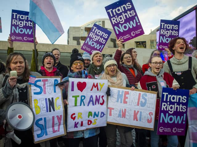 Trans rights supporters demonstrating outside the Scottish Parliament. Image: Lisa Ferguson/National World.
