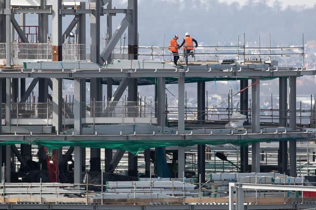 Construction workers on the site of the new St James' Shopping Centre that is being built in Edinburgh city centre