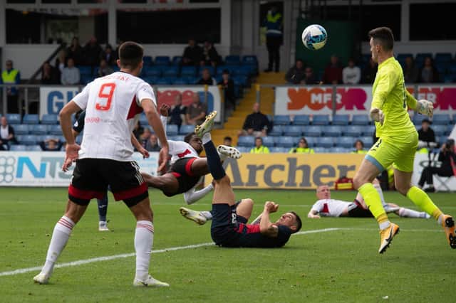 Aberdeen's Luis Lopes scores a fine goal to put the Dons ahead at Ross County.