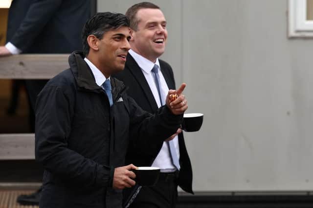 INVERNESS, SCOTLAND - MAY 23: Britain's Prime Minister Rishi Sunak (L) and Leader of the Scottish Conservative party Douglas Ross visit the Port of Nigg on May 23, 2024 in Inverness, Scotland. The Prime Minister is on a General Election campaign visit to Inverness area with Scottish Conservative leader Douglas Ross. Yesterday, Sunak unexpectedly announced a UK general election for Thursday, 4 July. (Photo Jeff J Mitchell/Getty Images)