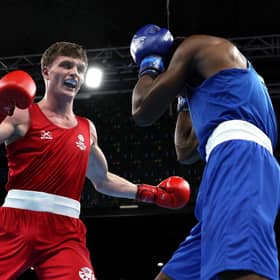 Sam Hickey (red) of Scotland enroute to victory over Adeyinka Benson (blue) of Nigeria during the Men’s Boxing Over 71kg-75kg Middleweight Quarter-Final match on day six of the Birmingham 2022 Commonwealth Games. (Photo by Eddie Keogh/Getty Images)
