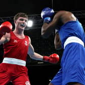 Sam Hickey (red) of Scotland enroute to victory over Adeyinka Benson (blue) of Nigeria during the Men’s Boxing Over 71kg-75kg Middleweight Quarter-Final match on day six of the Birmingham 2022 Commonwealth Games. (Photo by Eddie Keogh/Getty Images)