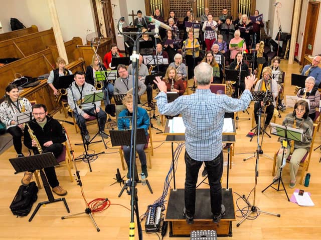 The group pictured on the day of the professional recording.