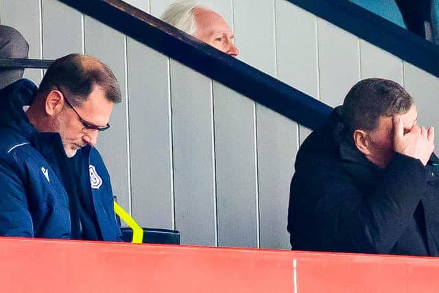 Dundee manager Mark McGhee (R) and managing director John Nelms during the recent 4-1 defeat to Livingston at Dens Park. McGhee returns to the dugout today against Rangers (Photo by Roddy Scott / SNS Group)