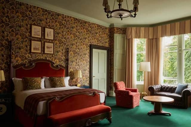 One of the 84 bedrooms, which include doubles, twins and suites, and are decorated in greens, russets and ochres.