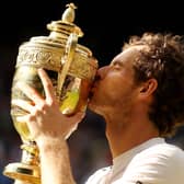 Andy Murray kisses the Wimbledon trophy following victory in the men's singles final in 2016 (Picture: Julian Finney/Getty Images)