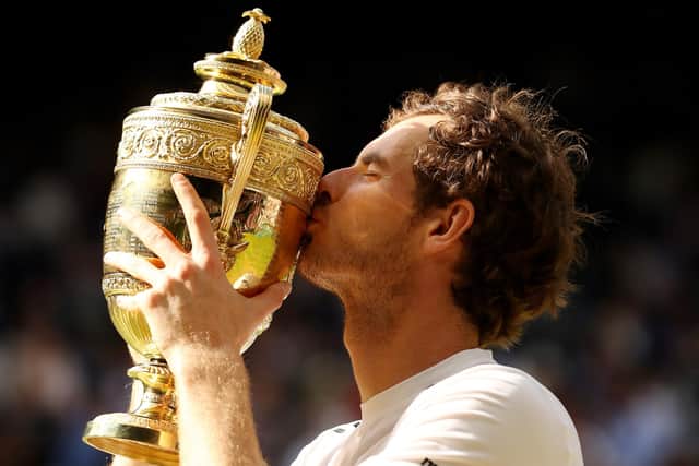 Andy Murray kisses the Wimbledon trophy following victory in the men's singles final in 2016 (Picture: Julian Finney/Getty Images)