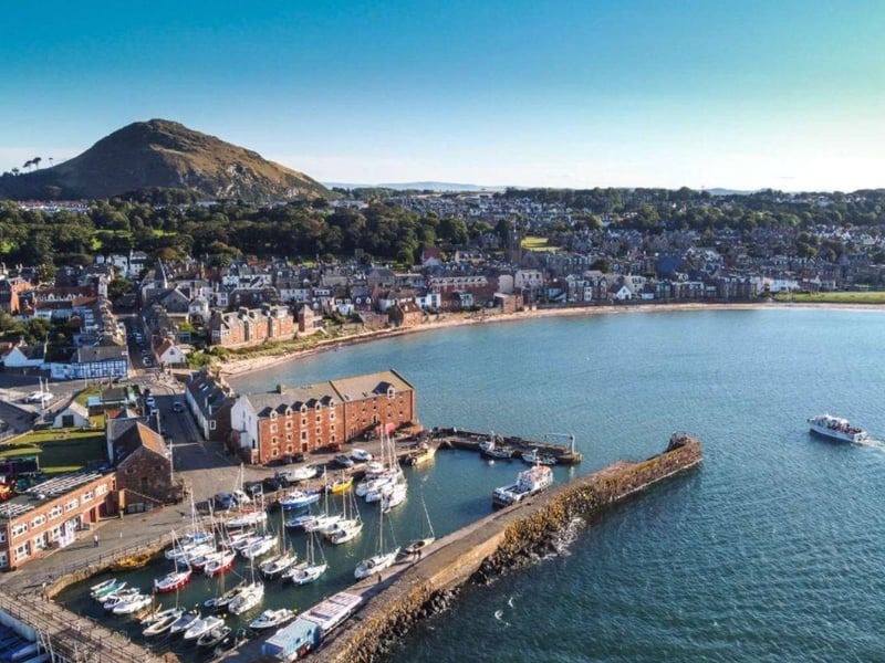 North Berwick, in East Lothian, is one of the most popular seaside tourist towns in Scotland - and just a short drive from Edinburgh. On the market for offers over £695,000, The Penthouse At The Granary occupies the third floor of a large historic harbourside converted granary building. Once used to store the grain cargo carried by boats from the harbour, it's now divided into apartment. Thsi property has three bedrooms, two bathrooms and a large living area overlooking the harbour. Contact Savills for more information.