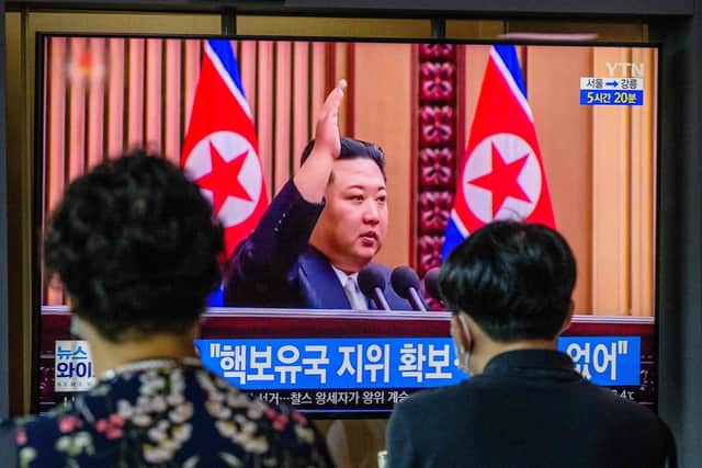 Kim Jong Un is shown on a television screen at a train station in Seoul after passing a law allowing it to carry out a preventive nuclear strike
(Photo by ANTHONY WALLACE/ Getty Images)
