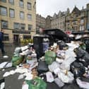 Overflowing bins in the Grassmarket area of Edinburgh where cleansing workers from the City of Edinburgh Council took part in strike action last year over a pay dispute.