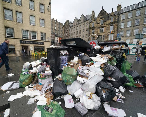 Overflowing bins in the Grassmarket area of Edinburgh where cleansing workers from the City of Edinburgh Council took part in strike action last year over a pay dispute.