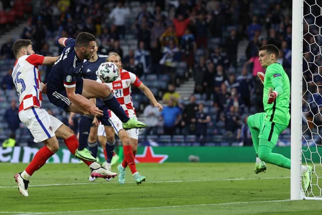 John McGinn goes close to scoring during Scotland's 3-1 defeat to Croatia in the Euro 2020 Group D fixture at Hampden. (Photo by LEE SMITH/POOL/AFP via Getty Images)