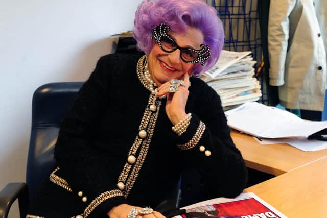 Dame Edna Everage - aka Barry Humphries - visited the Edinburgh Evening News' offices in 2013 to help 'edit' the paper'