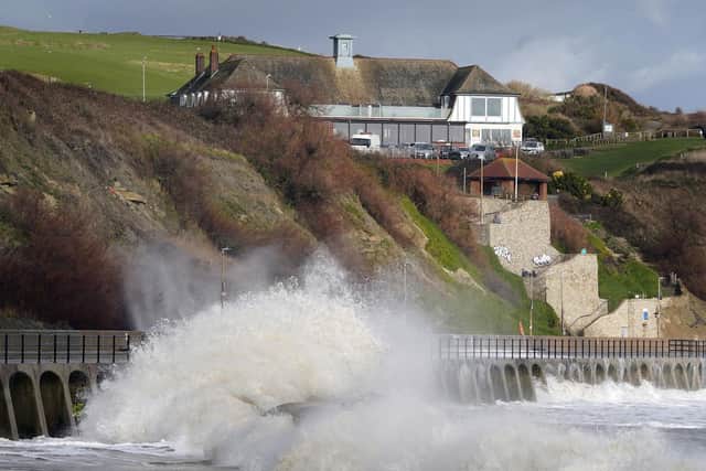Waves crash during strong winds in Folkestone, Kent during Storm Franklin earlier this week. Photo: Gareth Fuller/PA Wire.